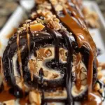 Gooey Chocolate Caramel Turtle Cake Roll